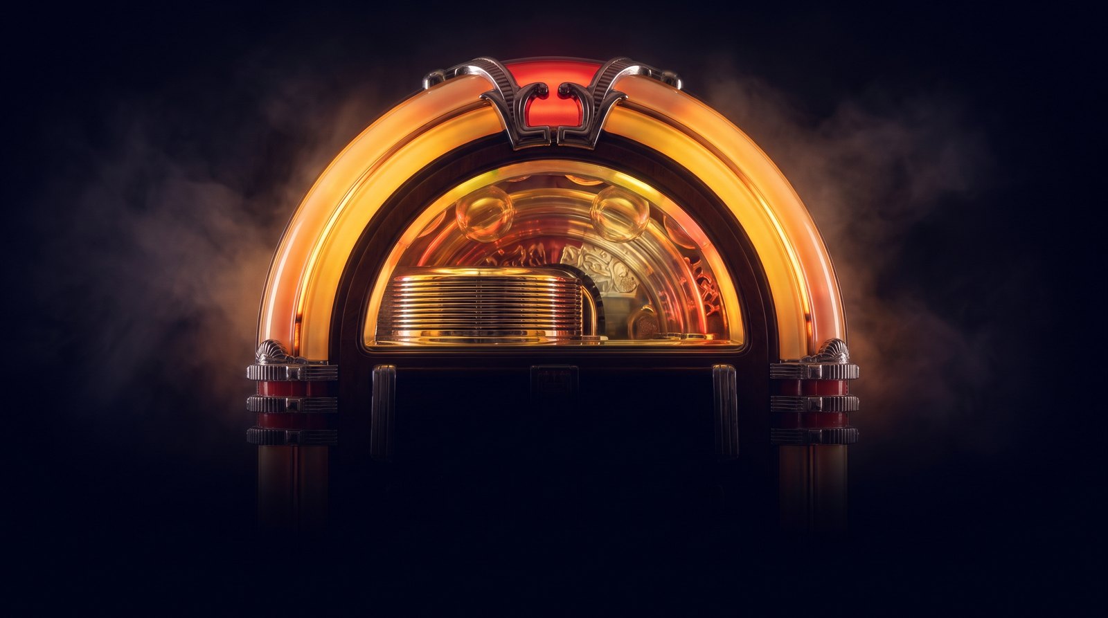 The house jukebox, glowing in a dark room